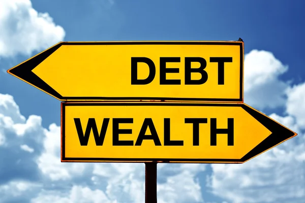 Debt or wealth, opposite signs — Stock Photo, Image