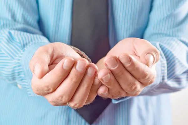 Businessman asking for money — Stock Photo, Image