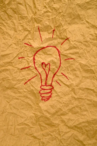 Idea light bulb on paper — Stock Photo, Image