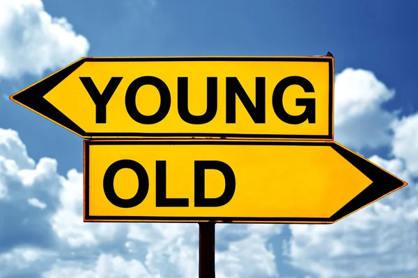 Молодые или старые, противоположные знаки — стоковое фото