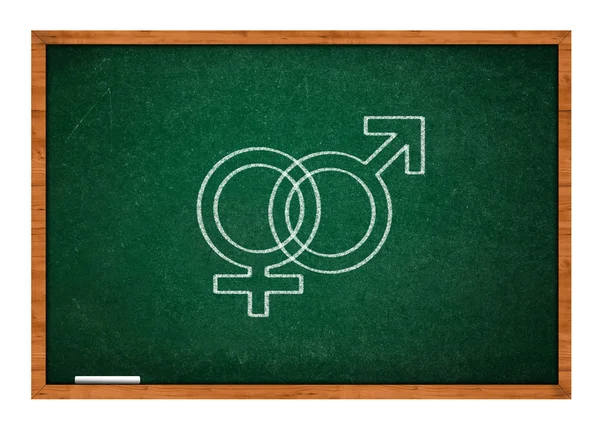 Símbolo sexual masculino y femenino en pizarra verde —  Fotos de Stock