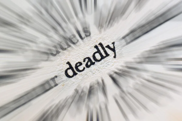 Word deadly in the book — Stock Photo, Image