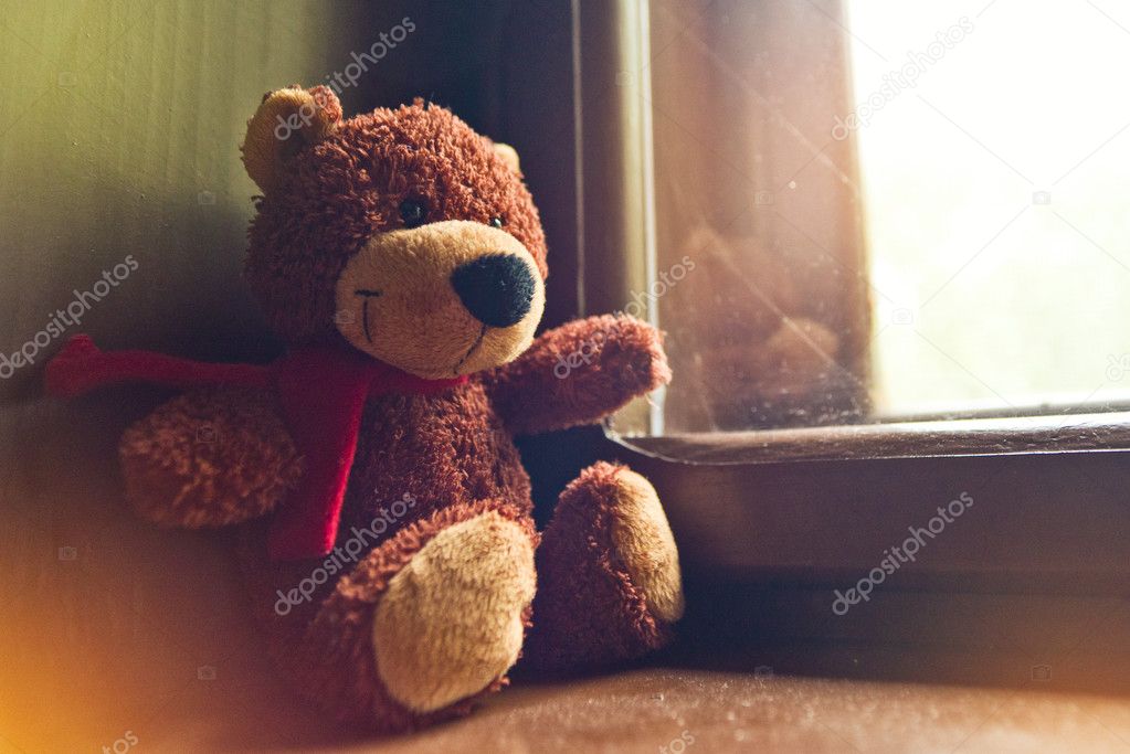 Teddy bear by the window — Stock Photo © stevanovicigor 32841353
