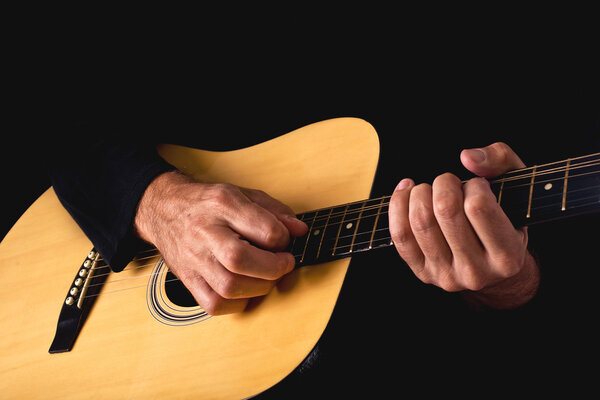 Man playing acoustic guitar