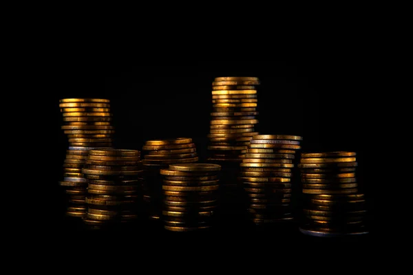 Golden coin stack on dark background — Stock Photo, Image