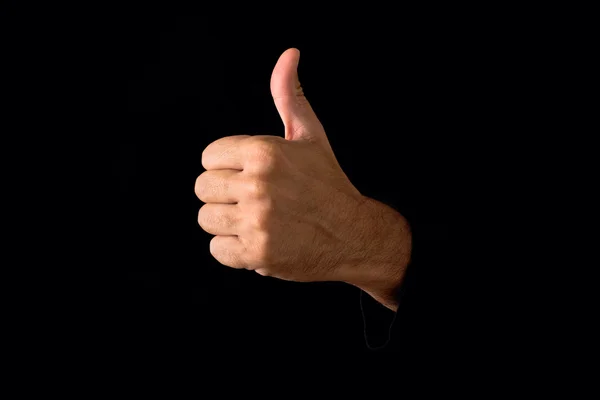 Thumb up on dark background — Stock Photo, Image