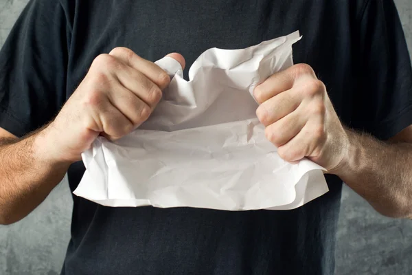 Man tearing contract paper — Stock Photo, Image