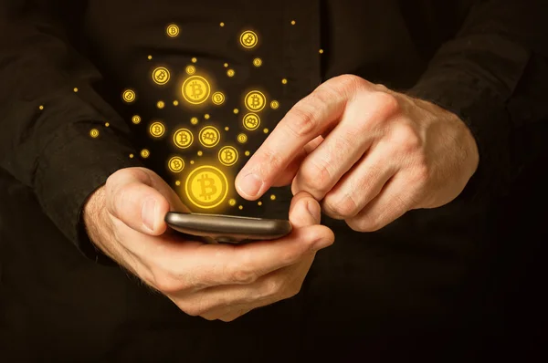 Bitcoins op de smartphone — Stockfoto