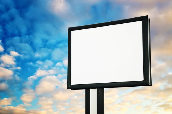 Blank advertising billboard against sky — Stock Photo, Image