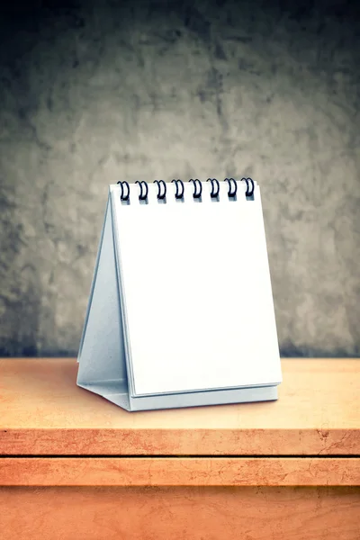 Blank desk calendar at office table — Stock Photo, Image