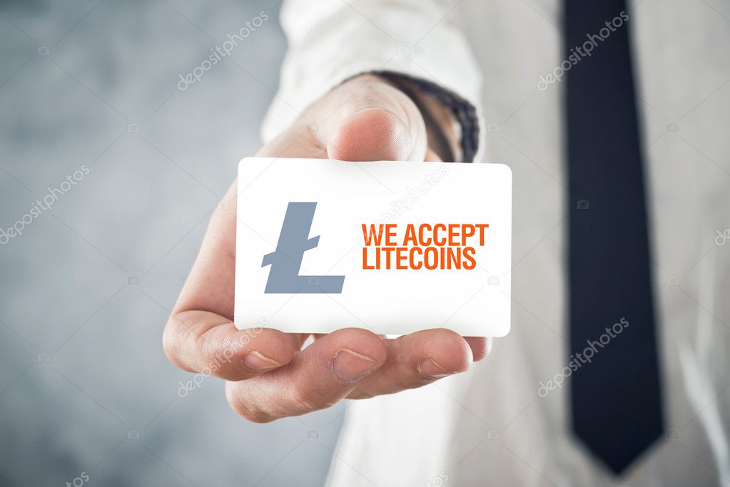 Businessman holding card with title WE ACCEPT LITECOINS