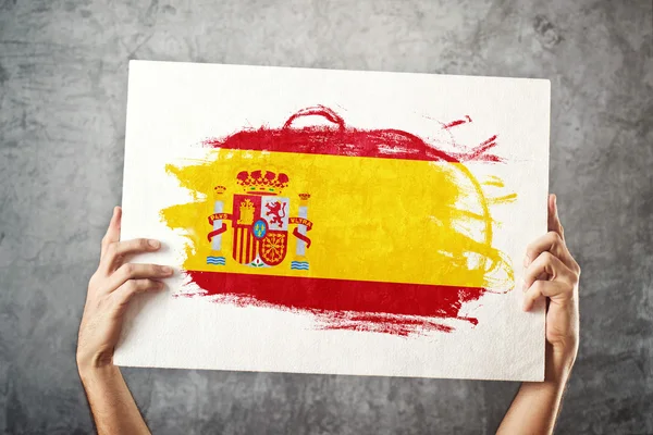 İspanya bayrağı. İspanyol bayrağı ile banner tutan adam.