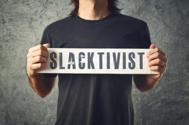 Man holding white banner with SLACTIVIST title clipart