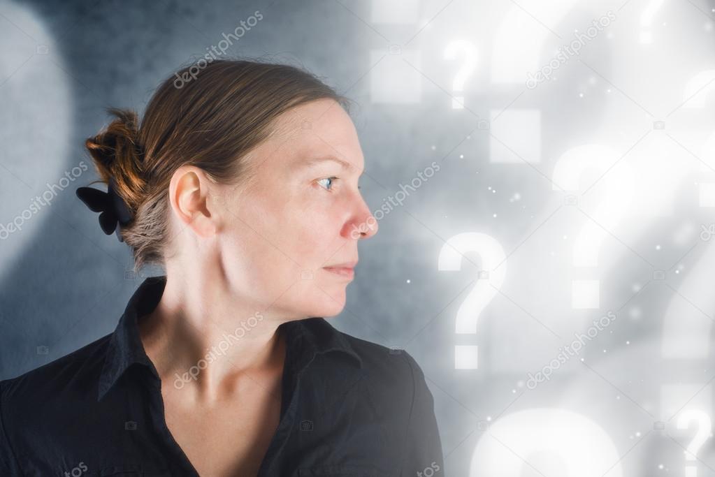 Portrait of beautiful woman questioning