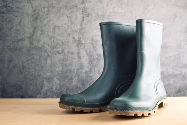 Green ruber boots for garden work — Stock Photo, Image