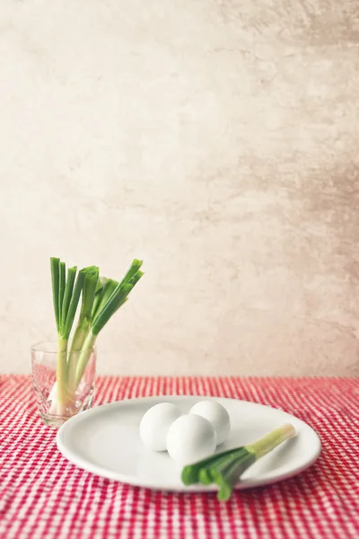 Boiled chicken eggs and fresh spring onion for breakfast — Stock Photo, Image