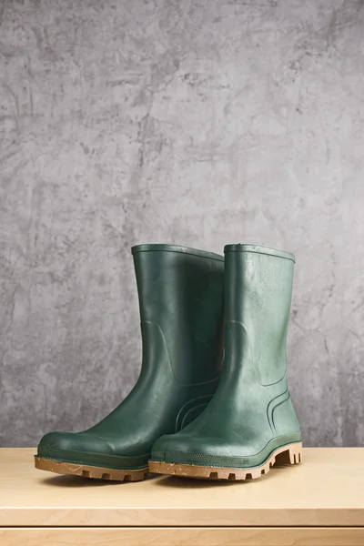 Green rubber boots for garden work — Stock Photo, Image