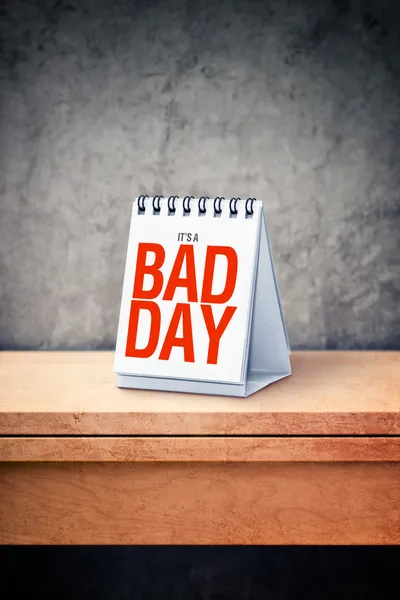 It's a bad day printed on desk calendar at office table — Stock Photo, Image