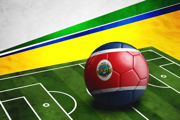 Soccer ball with Costa Rica flag on pitch — Stock Photo, Image