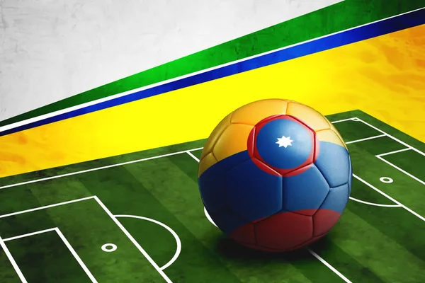 Soccer ball with Columbia flag on pitch — Stock Photo, Image