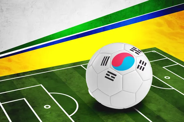 Soccer ball with South Korea flag on pitch — Stock Photo, Image