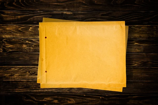 Yellow document envelopes on wooden tabletop — Stock Photo, Image