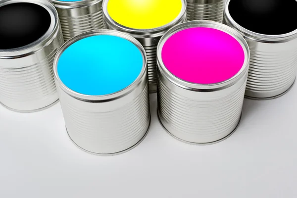 CMYK color paint tin cans opened top view — Stock Photo, Image