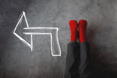 Red socks and arrow pointing to left clipart