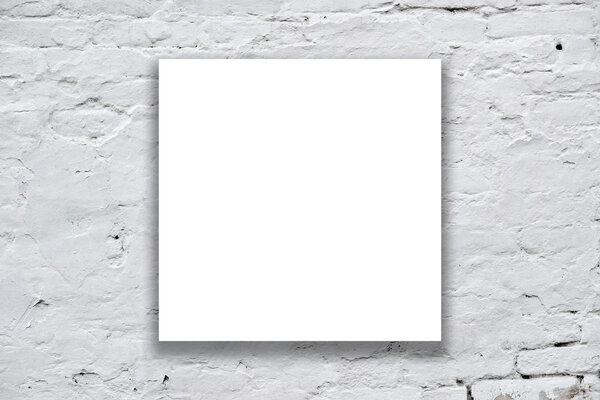 Square Poster hanging on the art gallery white wall.