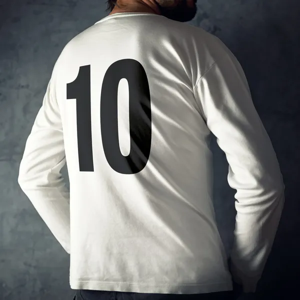 Hombre con camisa deportiva con número diez —  Fotos de Stock