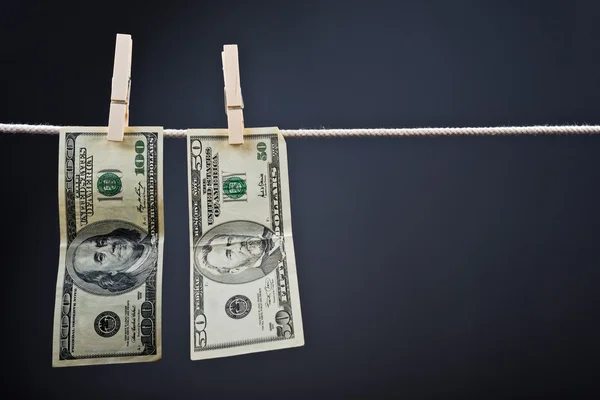 American Dollars hanging on rope — Stock Photo, Image