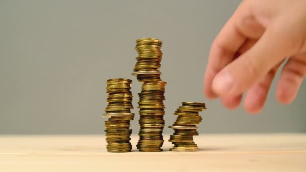 Hand stacking coins. Saving money, managing home budget. 1920x1080, full hd footage. — Stock Video