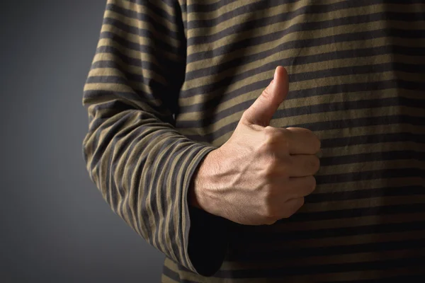 Casual man giving thumb up — Stock Photo, Image