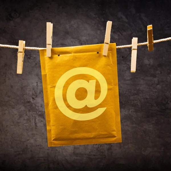 Mail Envelope with monkey sign on clothes rope — Stock Photo, Image