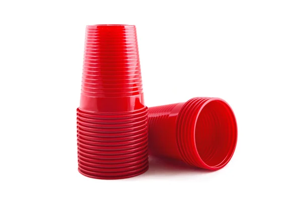 Plastic red cups stack on white background — Stock Photo, Image