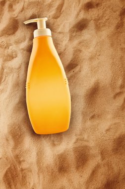 şişe güneşlenmek yağı veya güneş kremi