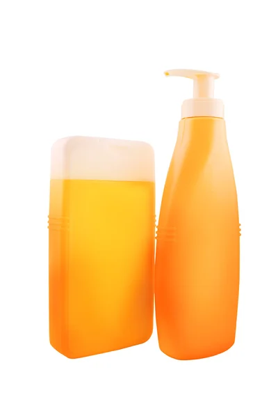 Bottles of Sunbath oil or sunscreen — Stock Photo, Image
