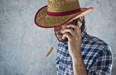 Farmer with cowboy straw hat clipart