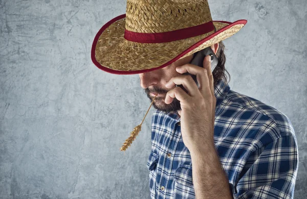 Farmer with cowboy straw hat — Stock Photo, Image
