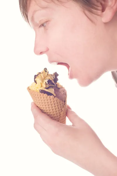 Hand eating chocolate ice cream — Stock Photo, Image