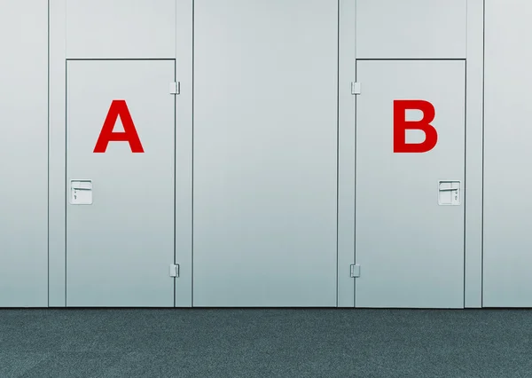 Closed doors with A and B marks — Stock Photo, Image