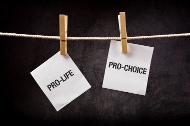 Pro-life vs pro-choice, abortion concept clipart