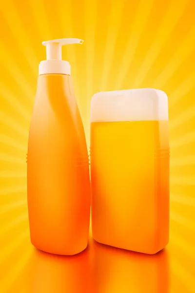 Sunbath oil or sunscreen bottles — Stock Photo, Image