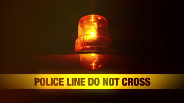 Police Line Do Not Cross Yellow Headband Tape and Orange flashing and revolving light. Murder Scene Police Ribbon. — Stock Video