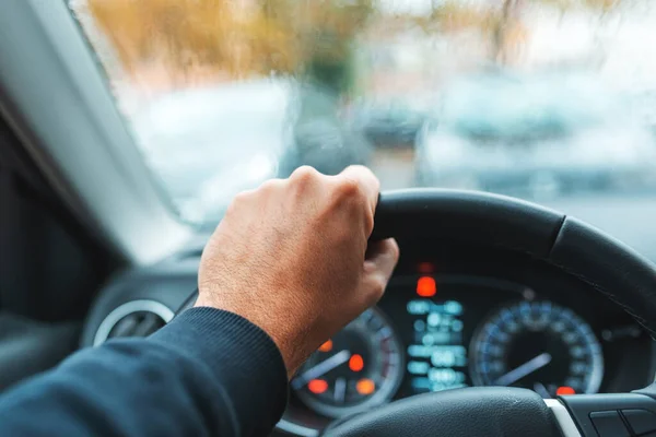 Driving Car Rain Male Hand Grabbing Steering Wheel Selective Focus — Stock Photo, Image