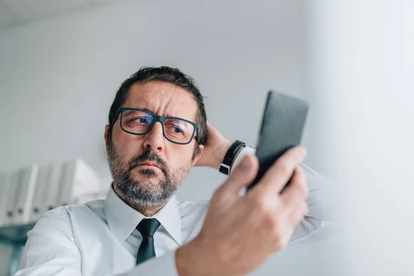Dissatisfied Pleased Businessman Taking Selfie Smartphone Office Selective Focus — Stock Photo, Image