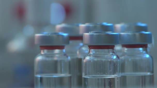Vaccine Vial Glass Bottles Rotating Medical Laboratory Close — Stockvideo