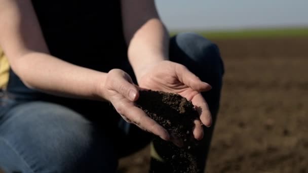 Hands Female Farmer Full Freshly Ploughed Fertile Soil Ground Springtime — Wideo stockowe