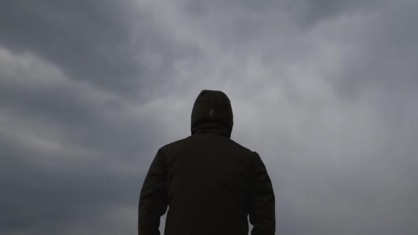 Rear View Male Person Wearing Hooded Jacket Dark Moody Dramatic — Stock Video