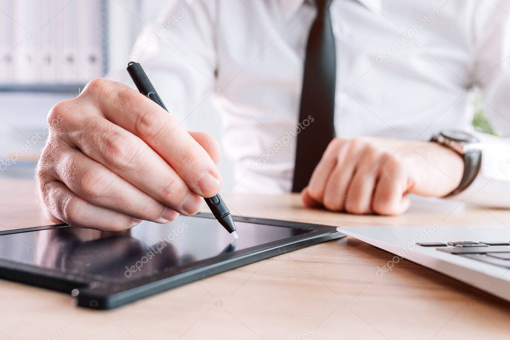 Electronic signature, businessman providing e-signature for document agreement using stylus and pad in office, selective focus